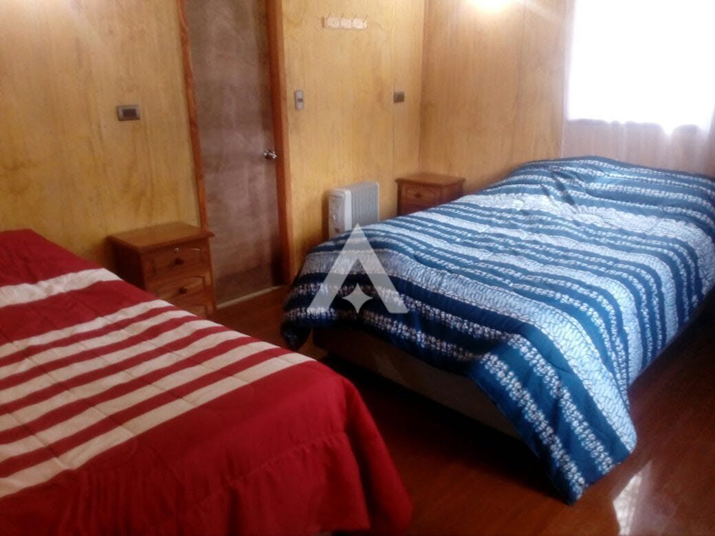 Cabaña en la Pradera Hermosa Granja a orillas del Río Liucura Pucon
