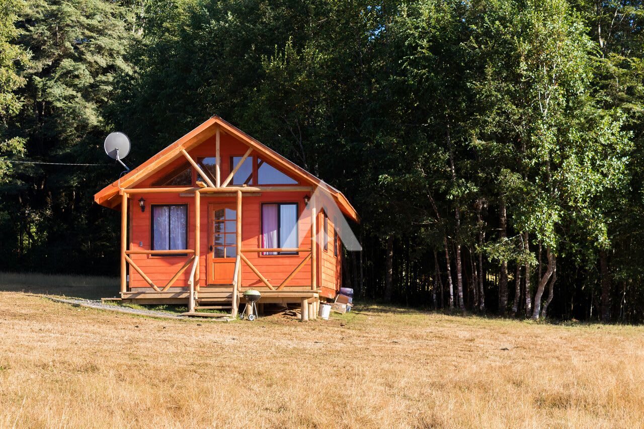 Cabaña en la Pradera Hermosa Granja a orillas del Río Liucura Pucon