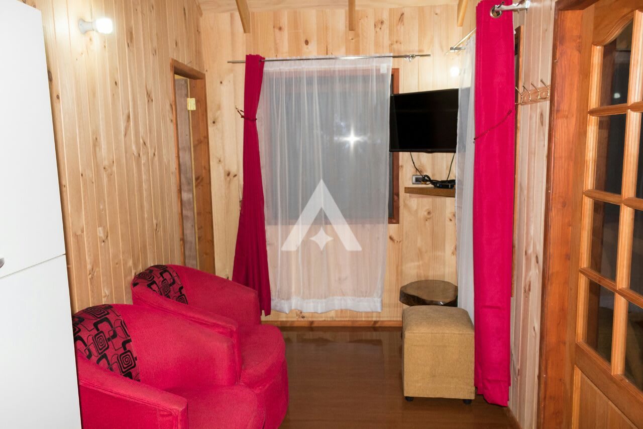 Cabaña en la Pradera Hermosa Granja a orillas del Río Liucura Pucon