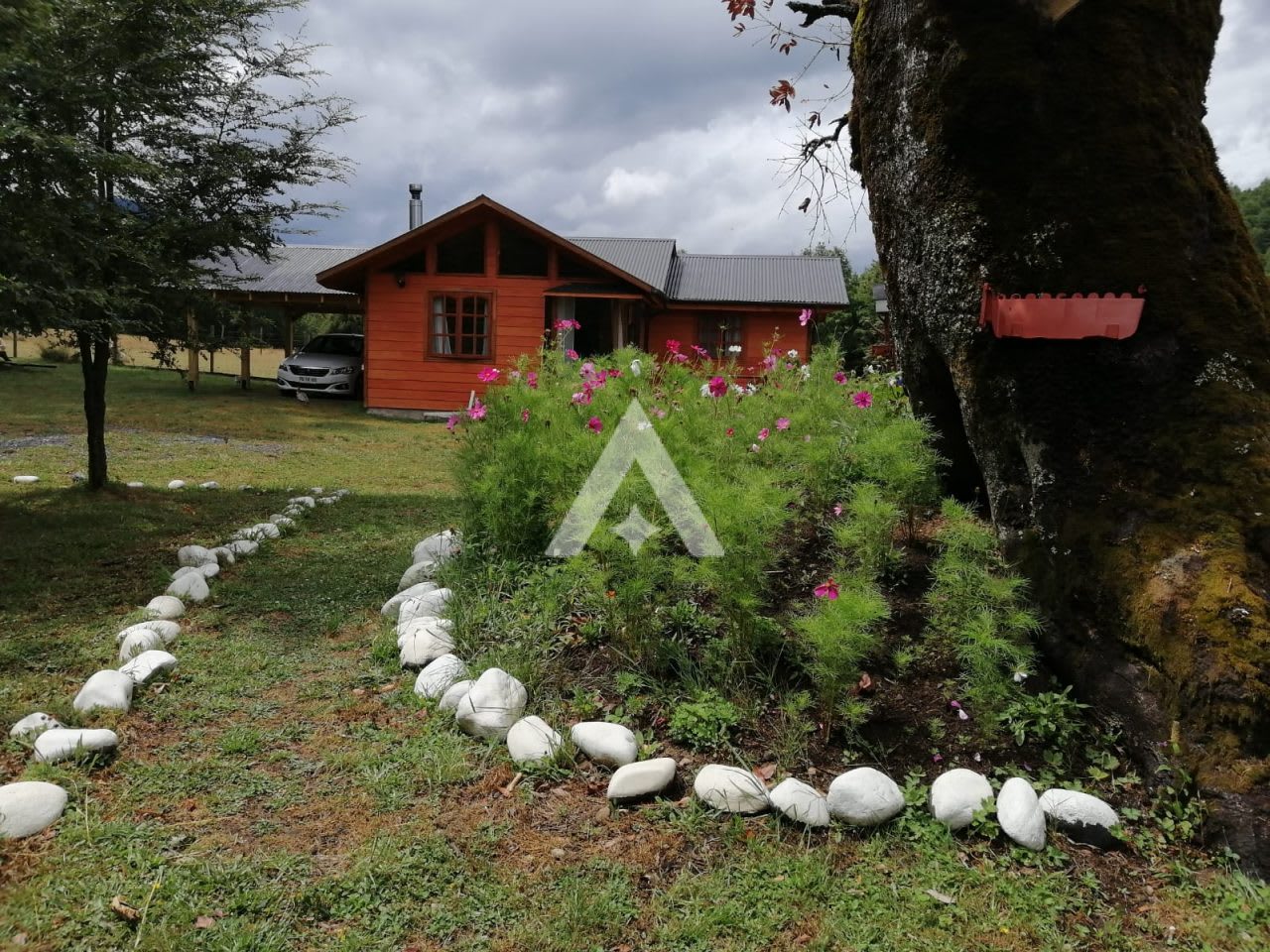 Cabañas & Tinajas Hermosa Granja a orillas del Río Liucura Pucon